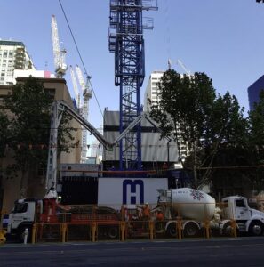 Pumping of SCC from a truck using a crane pump at a building site